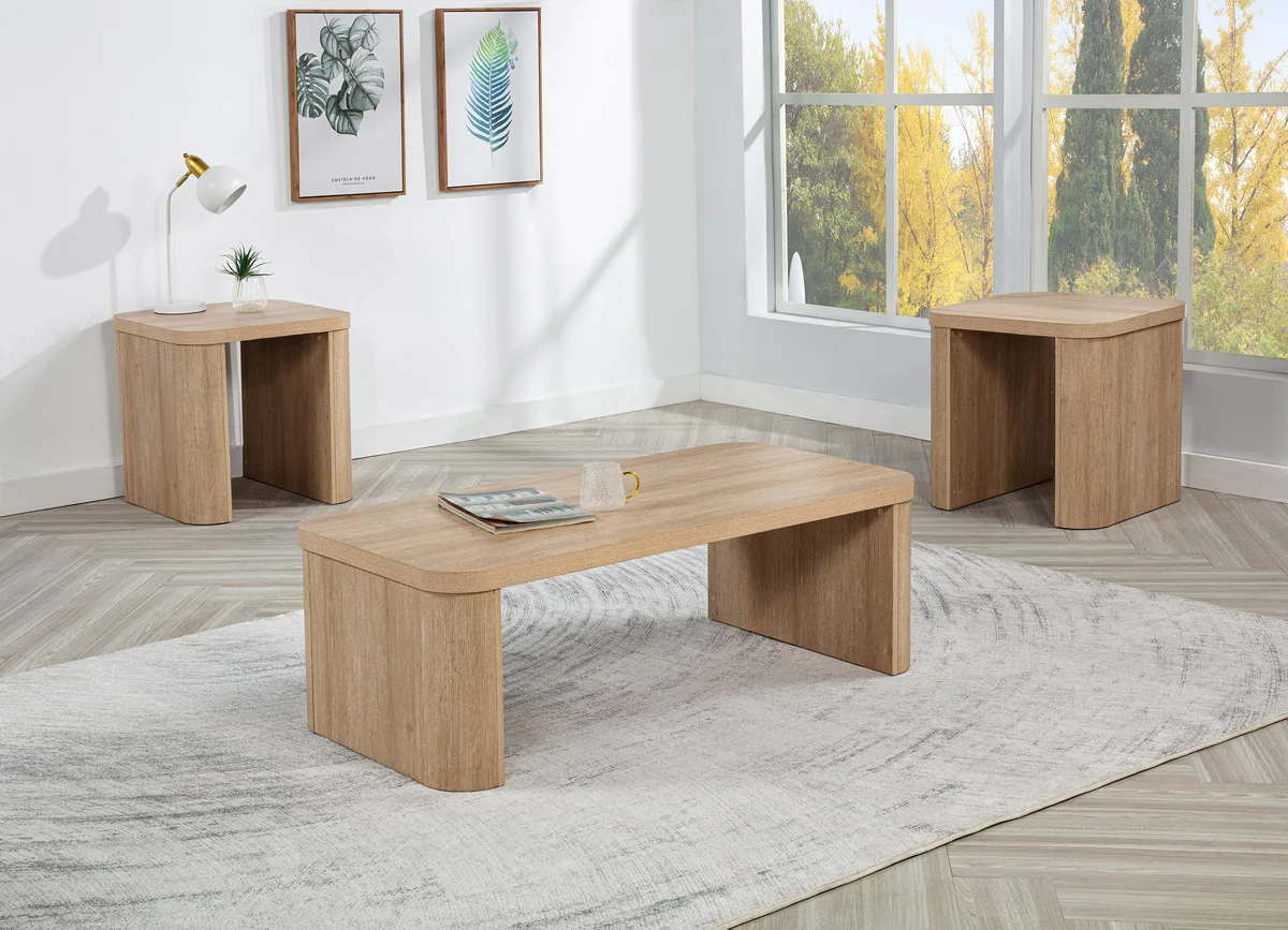Three-piece occasional table set in natural wood with curved edges, coffee table has hidden casters