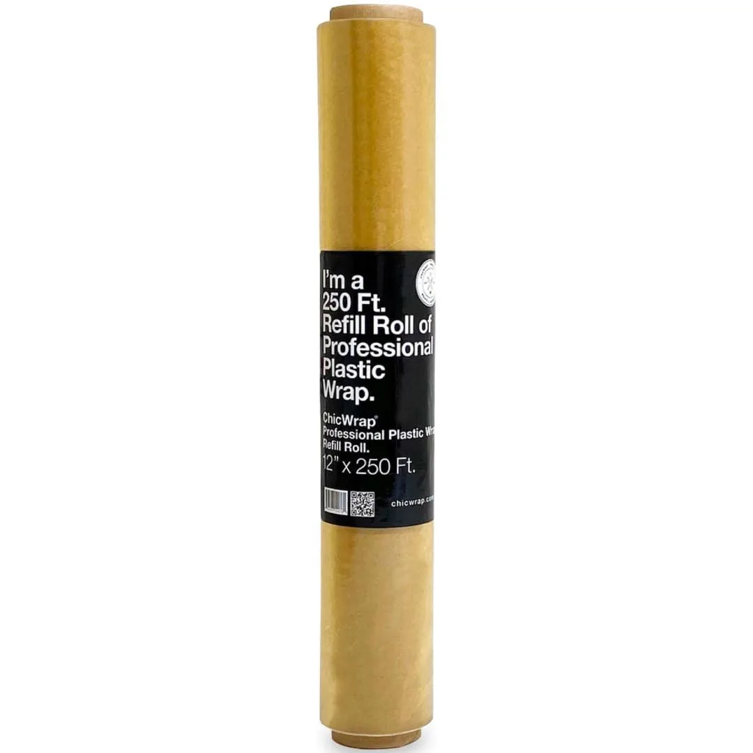 A clear plastic film roll, 12 inches wide, on a cardboard core