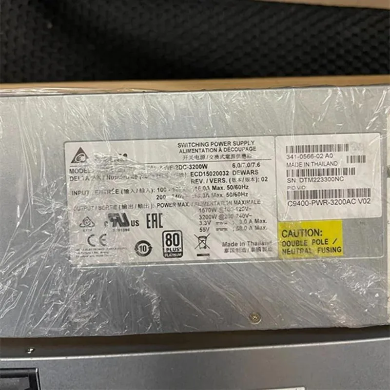 Rectangular ATX power supply unit, matte black metal casing, cooling fan grille visible, modular cable sockets on one side, 3200W label