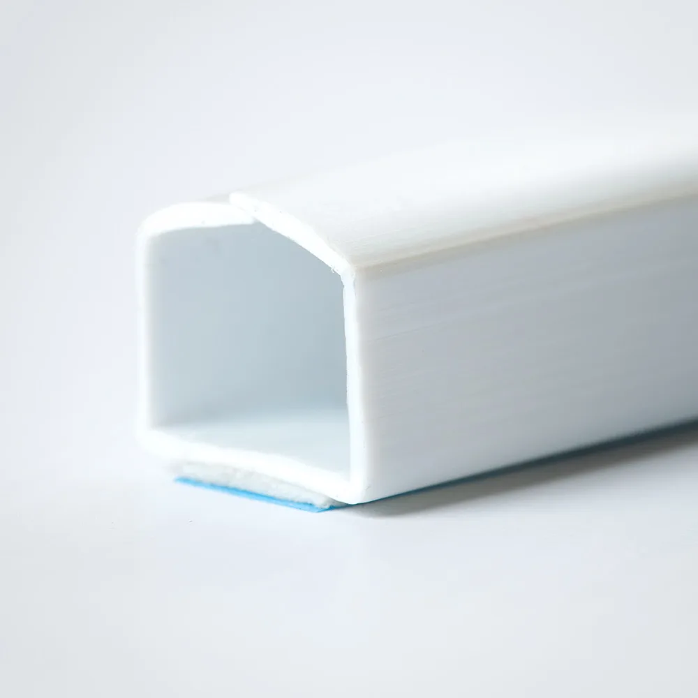 PREMIERE RACEWAY PRODUCTS PREMIERE RACEWAY PRODUCTS FWH-11411 Wire Hider 1/2" x 48" White Base Molding Self Adhesive — product photo