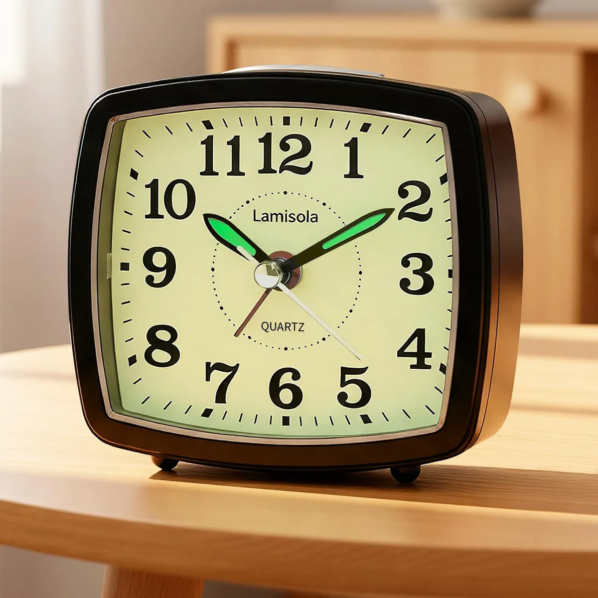 Small black analog desk clock 3.5 inches with white dial and light button