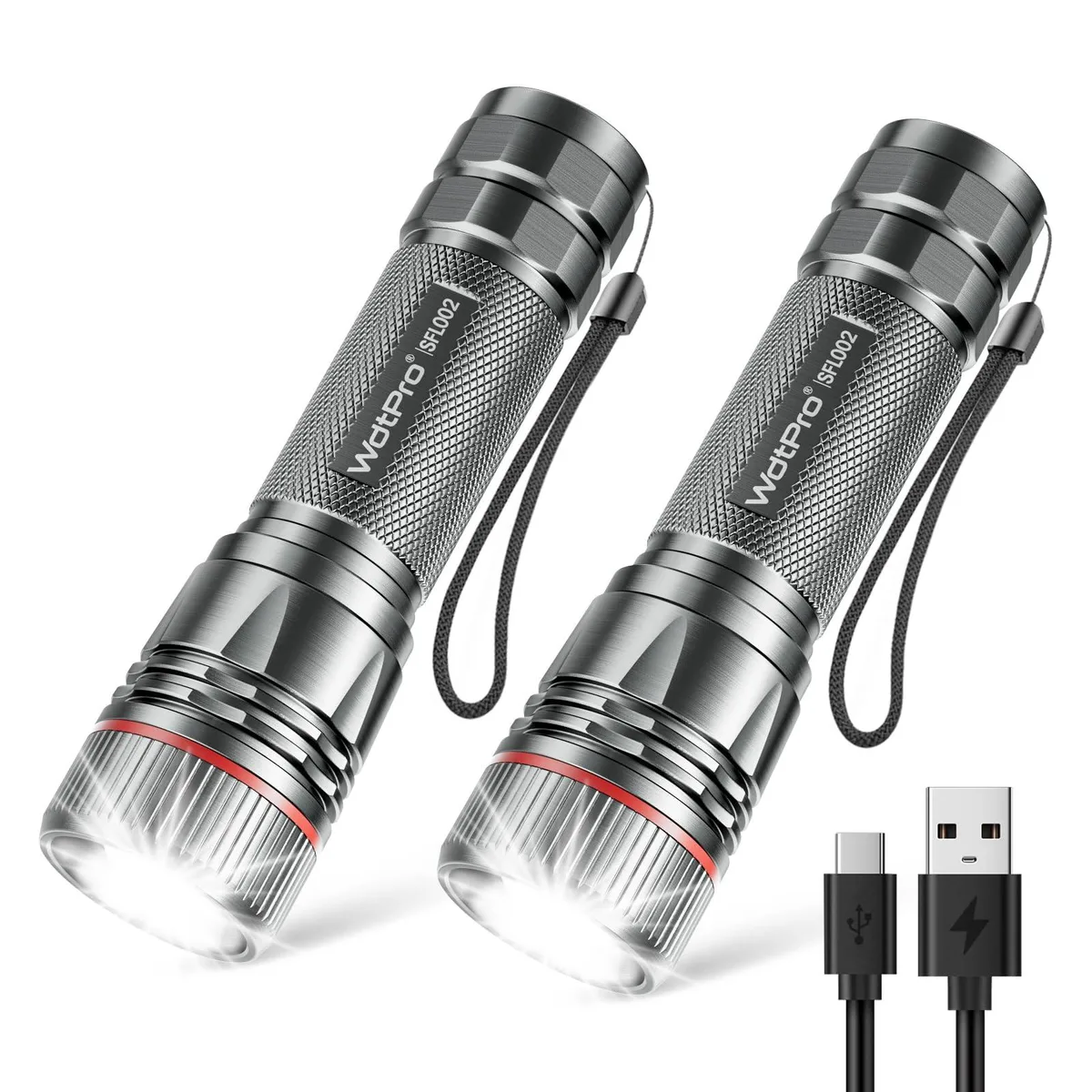 Two compact grey aluminium flashlights with Type-C ports and adjustable focus lying side by side