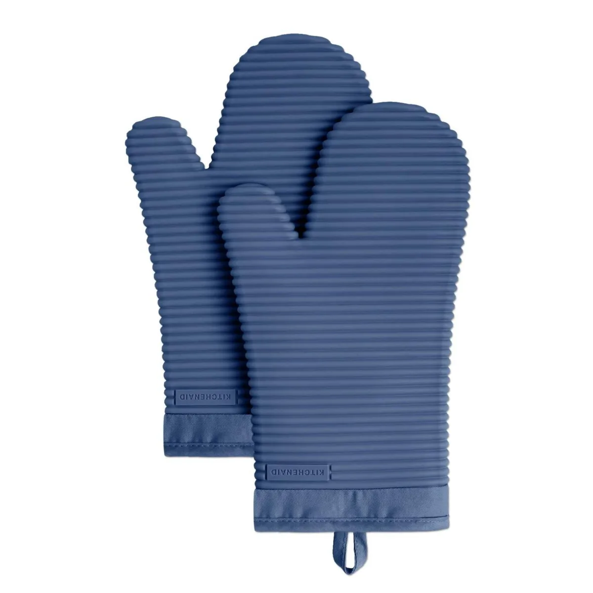 Two blue willow silicone oven mitts with ribbed texture and cotton cuffs