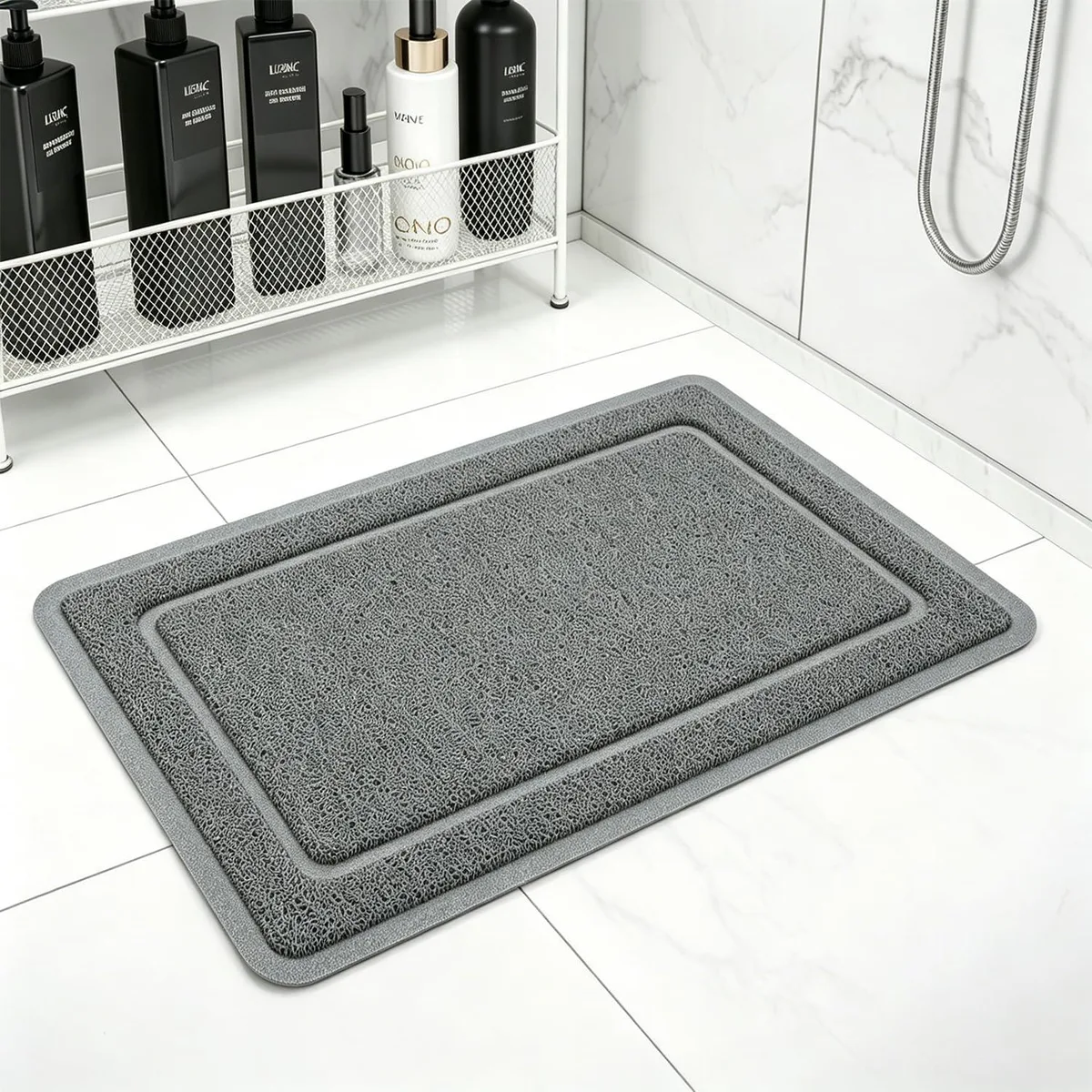 Grey rectangular PVC bath mat 24 by 16 inches point 4 inch thick with textured surface and drain holes