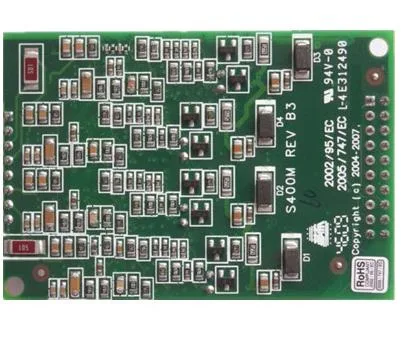 Green rectangular circuit board with four modular ports and surface-mounted components