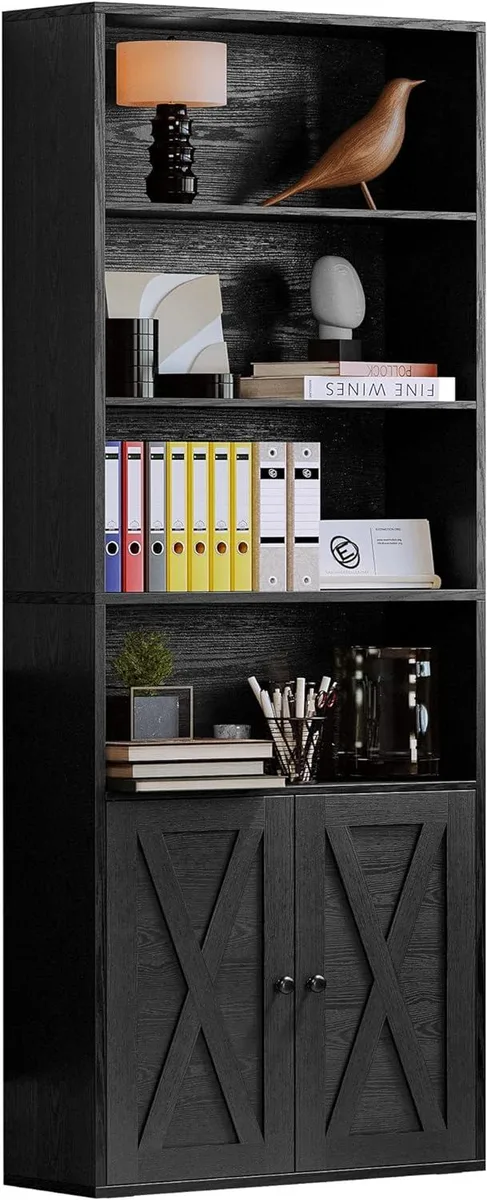 Tall black industrial bookshelf with six open shelves, metal frame and wood panels