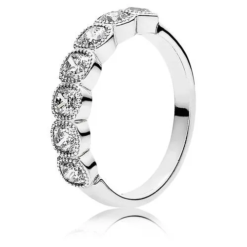 Silver-tone ring with a large cushion-cut clear stone in a four-prong setting