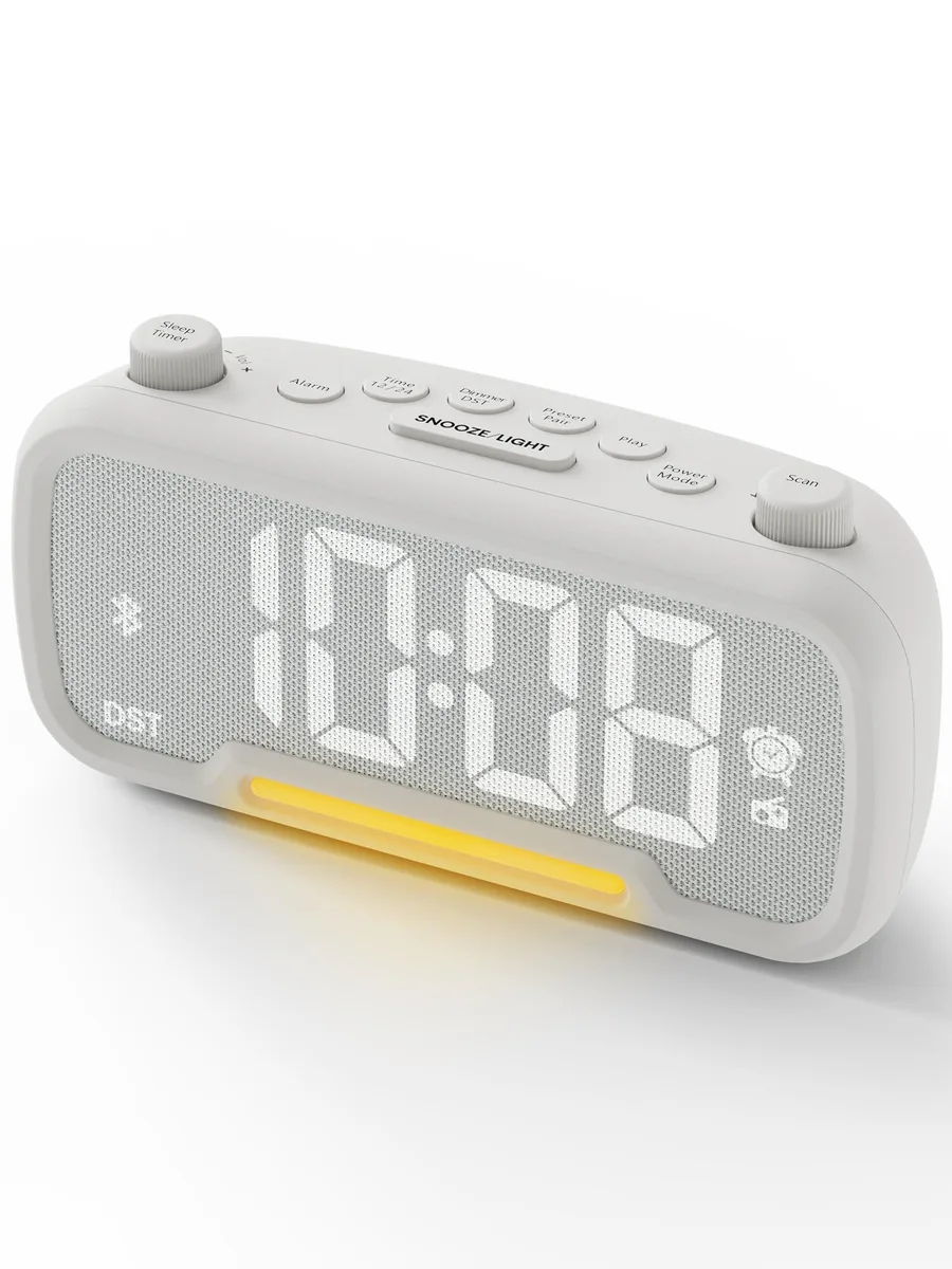 White fabric-front digital clock radio with rotary knobs and USB-C port