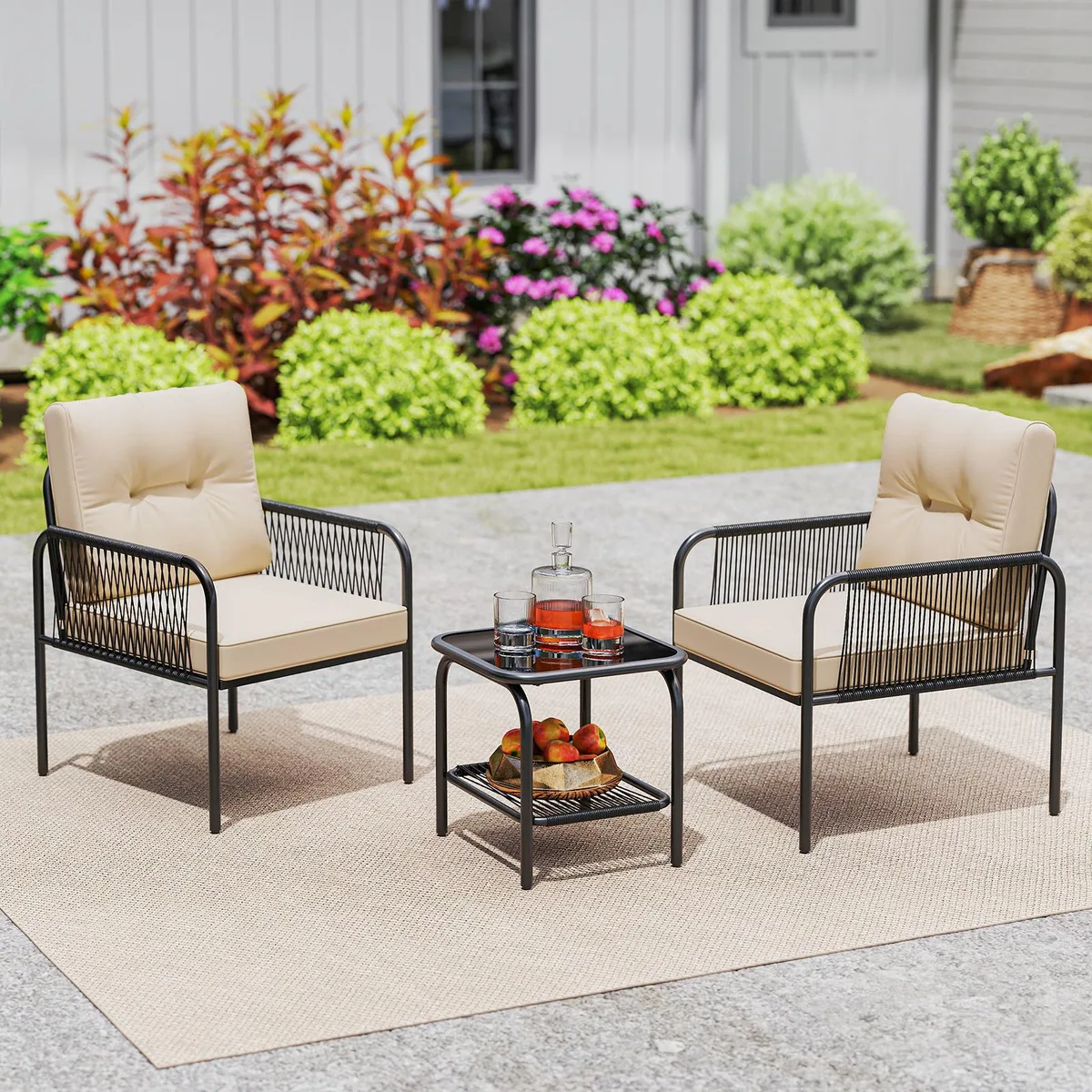 Three-piece beige wicker bistro set with two chairs and glass-top table