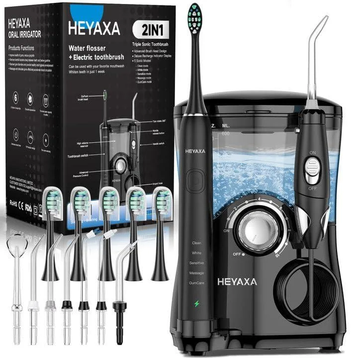 Black countertop oral irrigator with large water tank and ultrasonic toothbrush handle, 14 by 15.6 by 21.9 cm