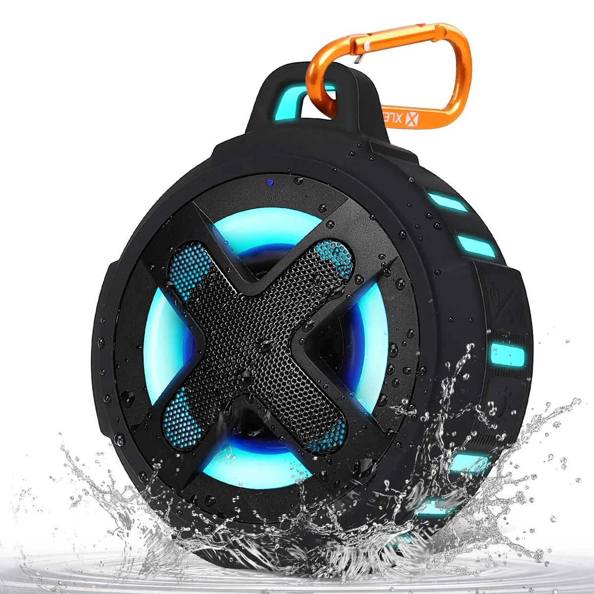 Black rectangular Bluetooth speaker with a matte silicone cover, integrated clip and lanyard loop, compact enough to hold in one hand