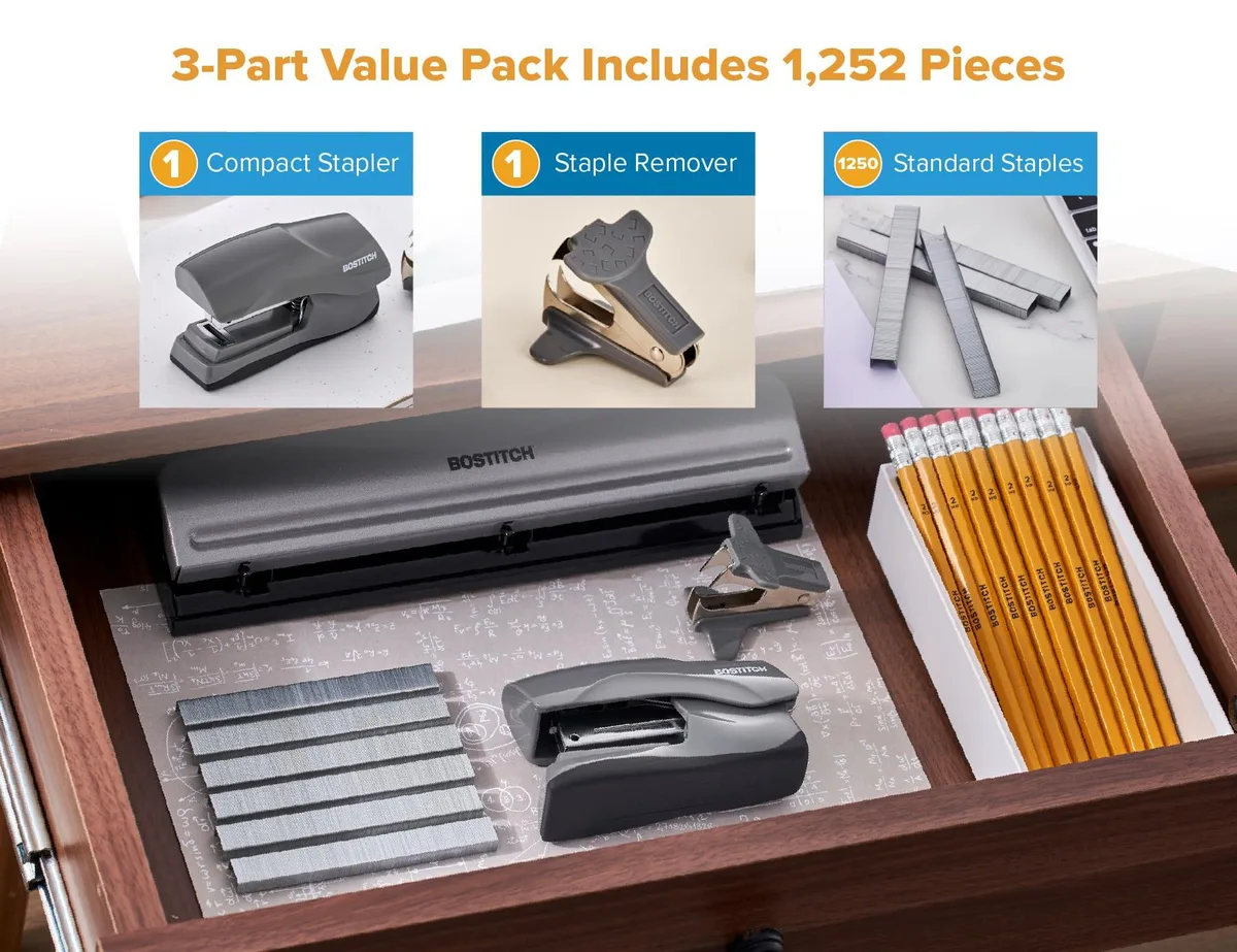Gray metal manual stapler, compact palm-sized, flat clinch, rubber base, opens 180 degrees