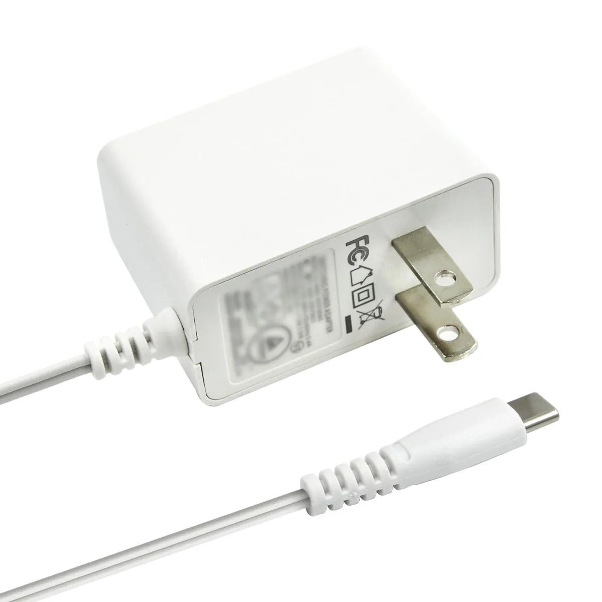 Small black rectangular power adapter with barrel connector and fixed AC prongs