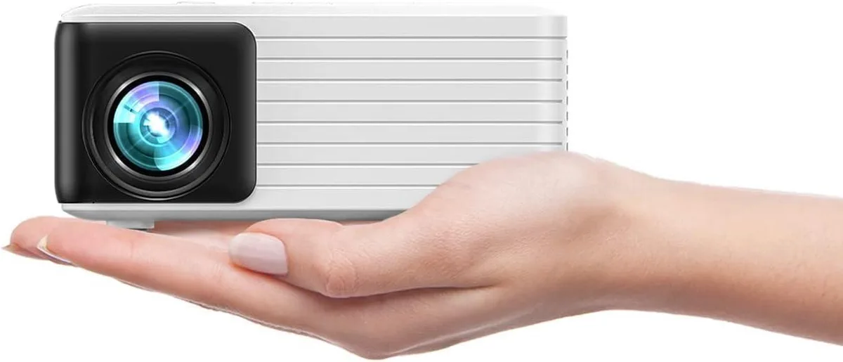 Compact rectangular mini projector with matte finish, palm-sized and lightweight