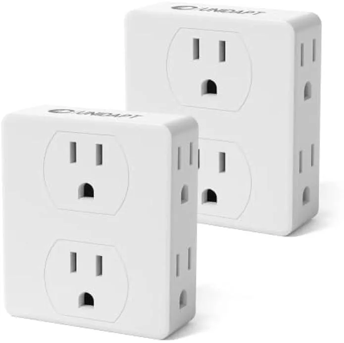 White rectangular wall tap with six three-prong outlets on front and sides measuring 2.9 by 2.5 inches shown in a two-pack