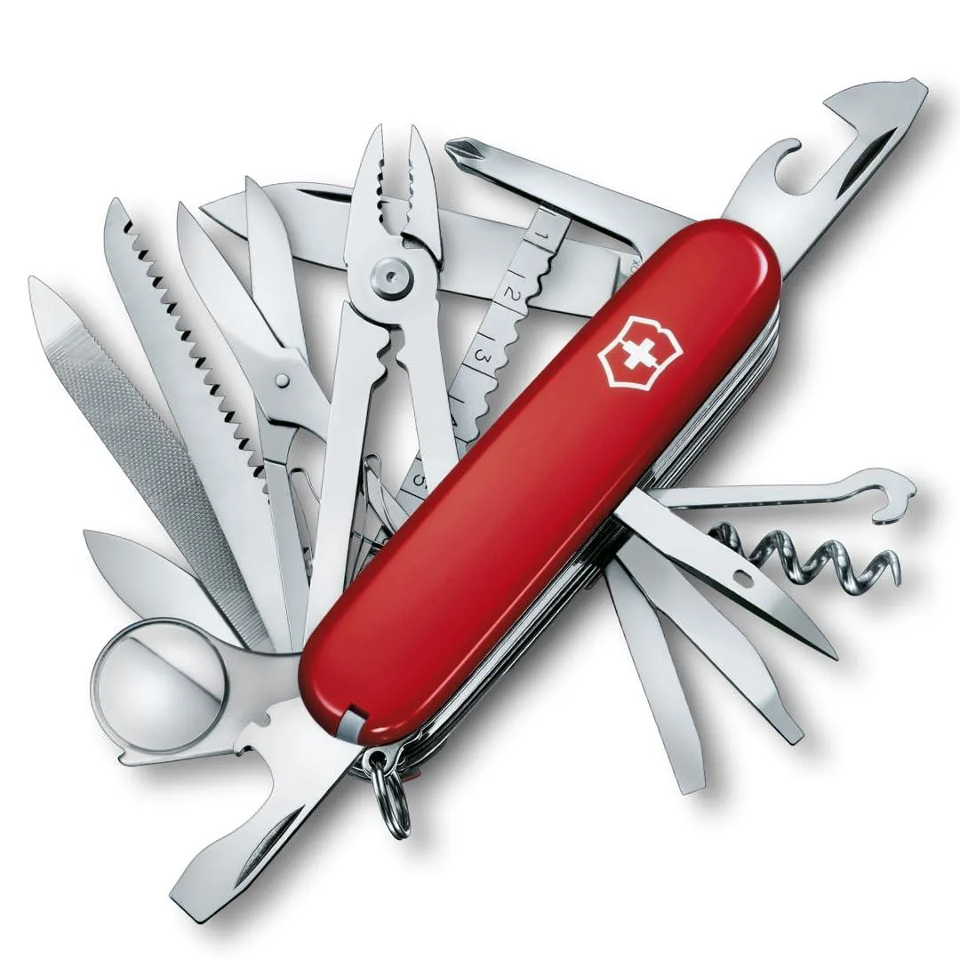 Red Victorinox Swiss Champ pocket knife folded showing textured plastic scales and stainless steel tools