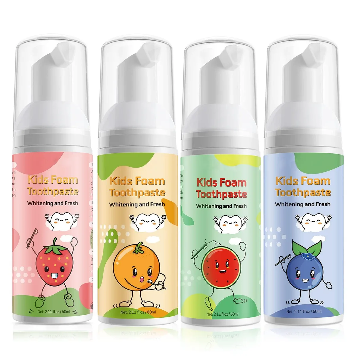 Four small foam toothpaste bottles in strawberry orange watermelon blueberry flavours
