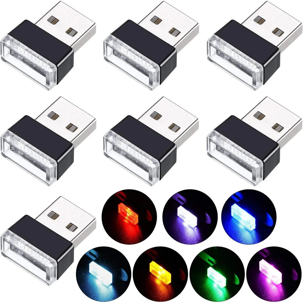 Seven tiny USB plug lights in assorted colours, each about two centimetres long, matte ABS bodies