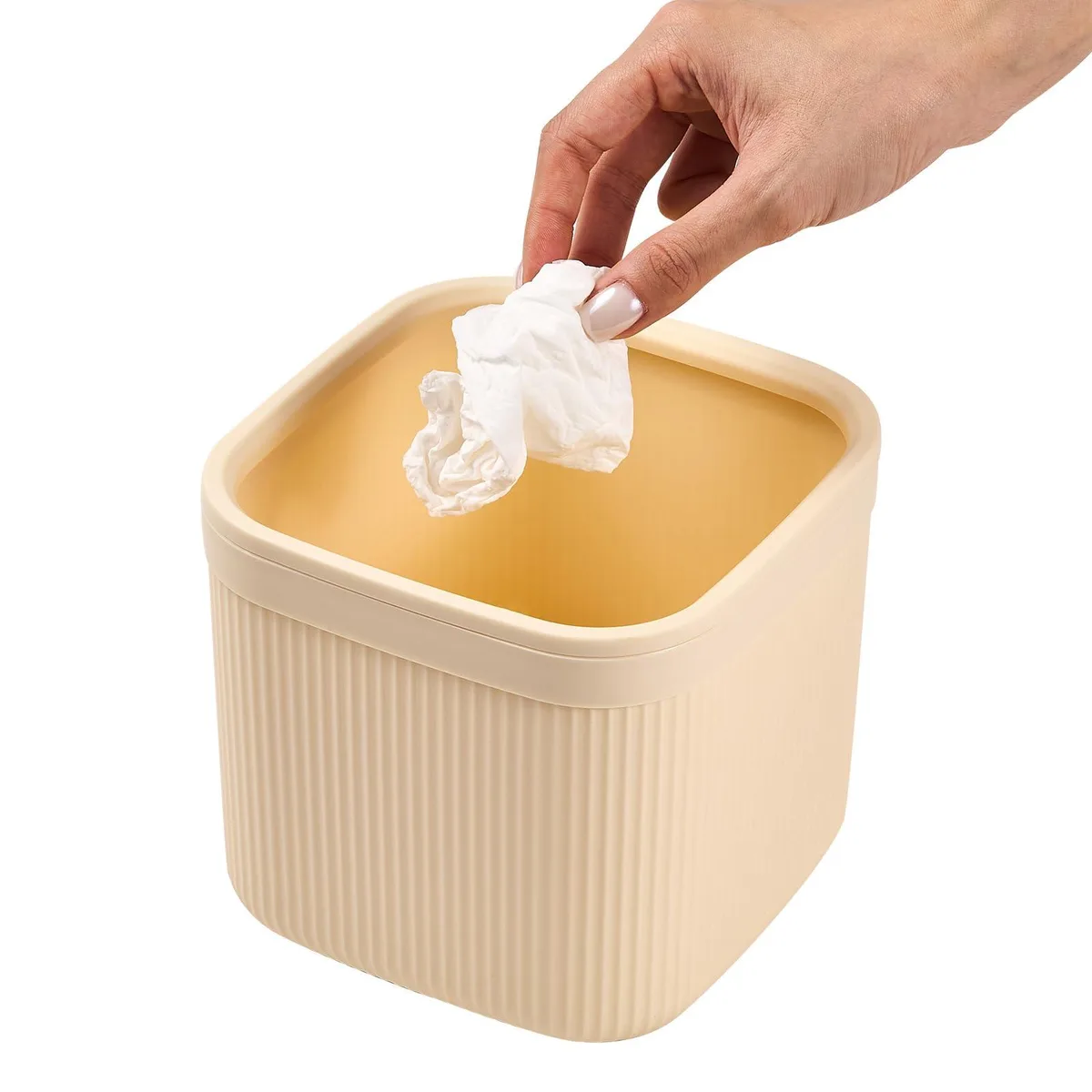 Small white open-top desktop waste bin, 2.8L capacity, smooth cream finish, non-slip base