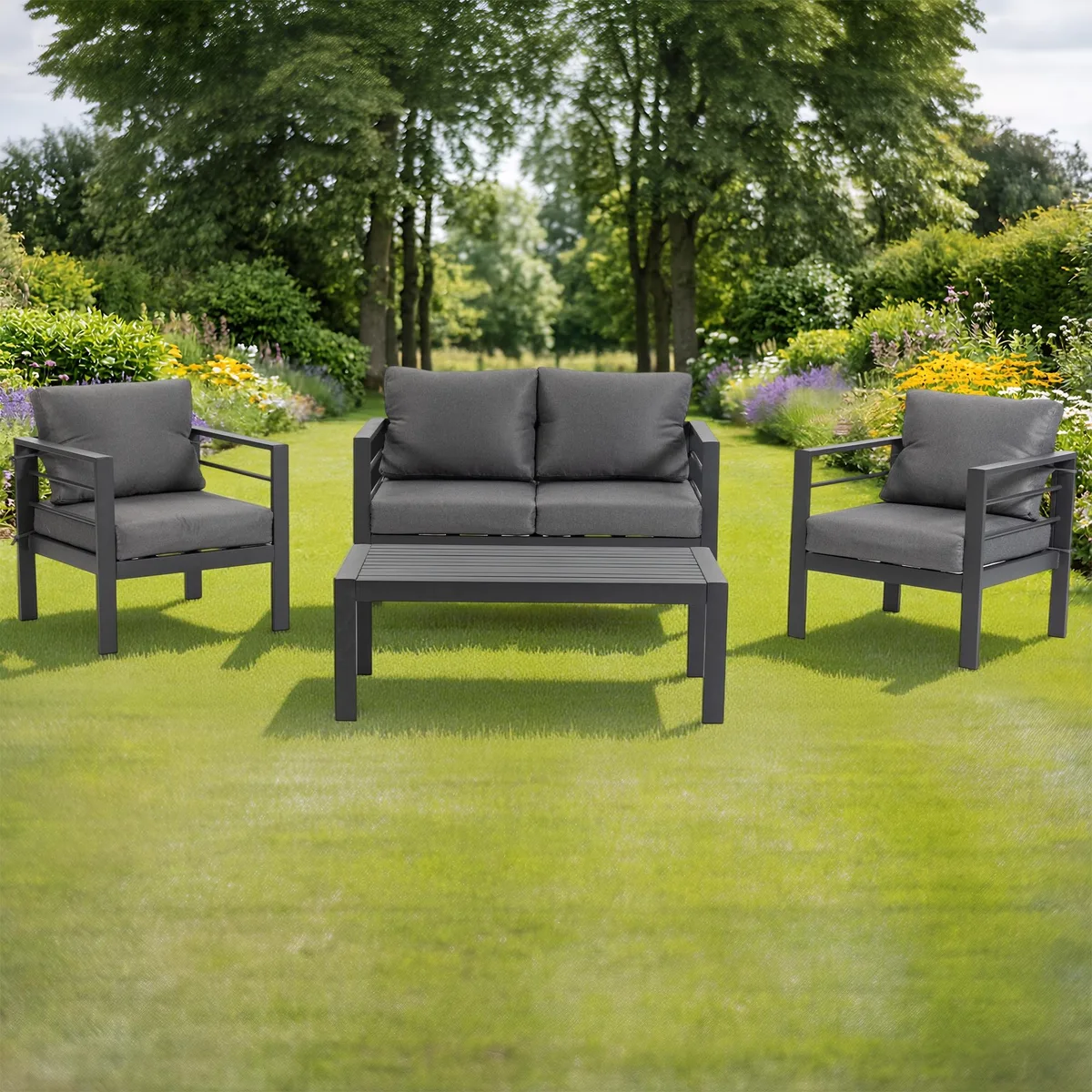 Grey four-piece patio set with metal frames, thick cushions and matching coffee table