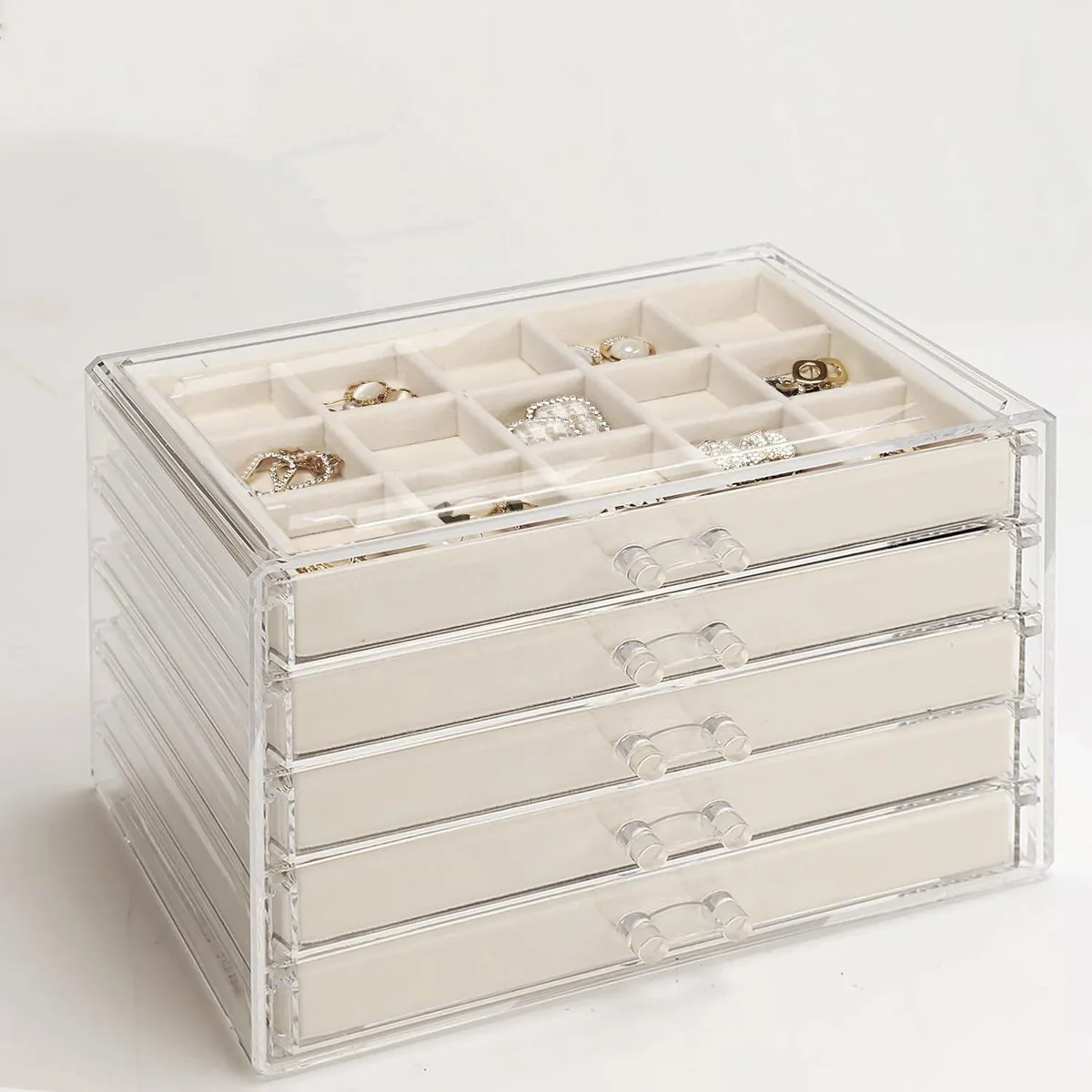 Clear acrylic jewelry box with five silver drawers and velvet lining