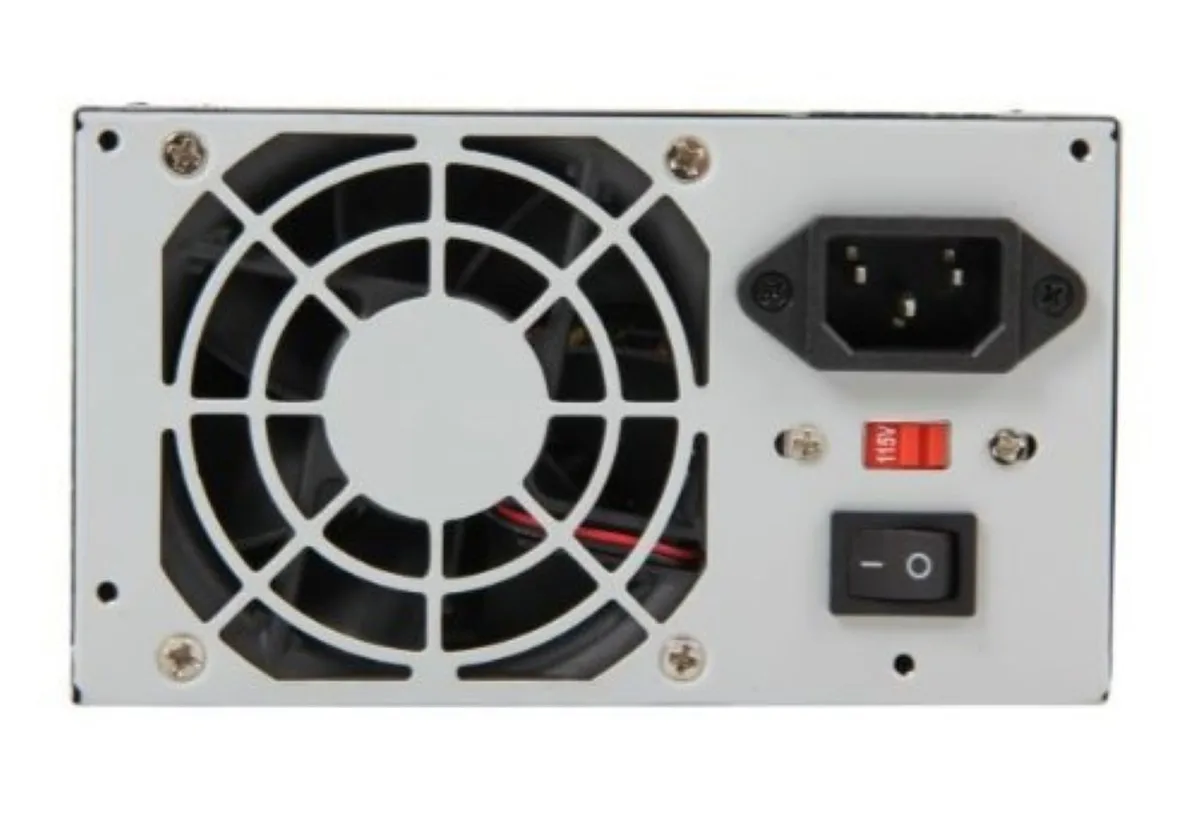 Rectangular metal power supply unit with fan grille and cable bundle