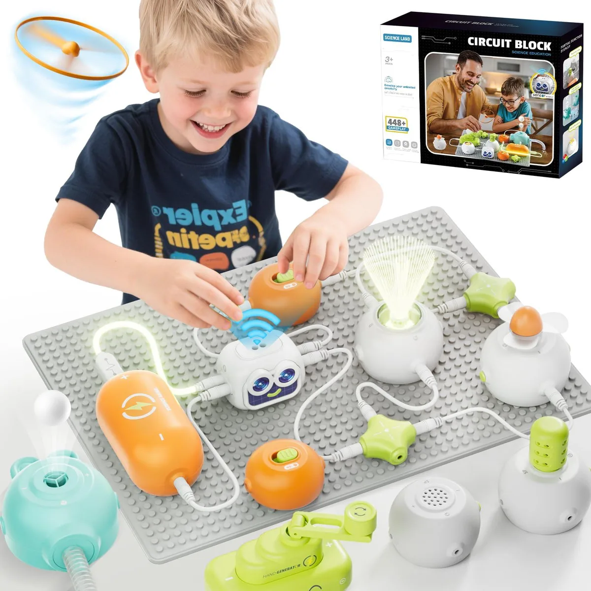 Colourful plastic snap-together circuit kit with grid base and assorted modules
