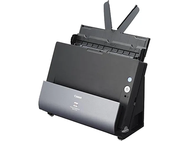 Compact upright document scanner in matte black and grey, top feed tray, front output, USB cable visible