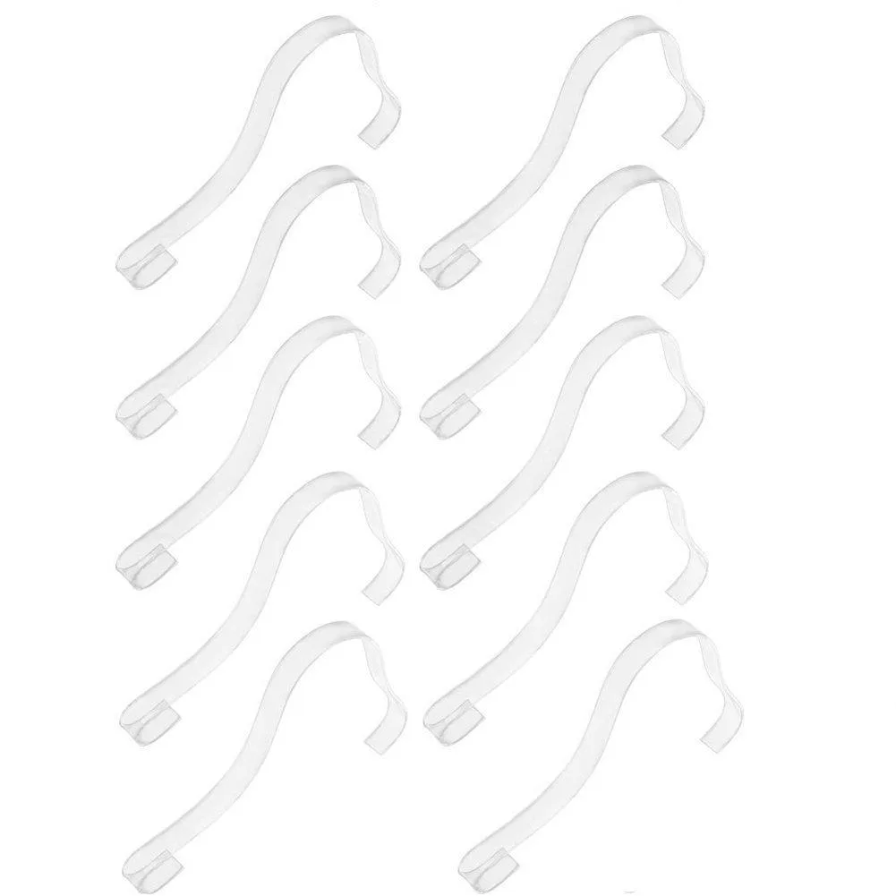 Five pairs of clear acrylic shoe inserts, flat and transparent
