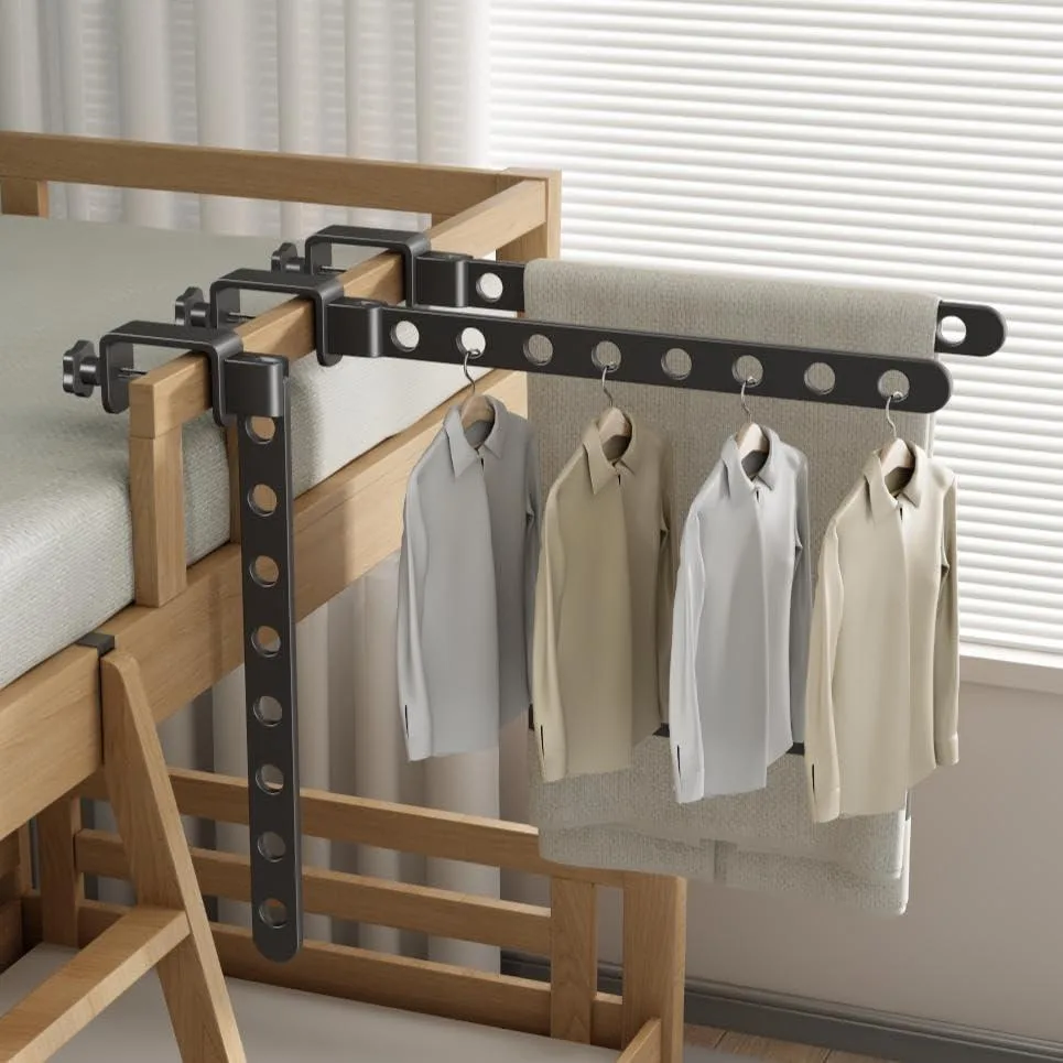 Silver aluminium clamp-on drying rack folded flat against a wall, 19.3 by 2.3 inches