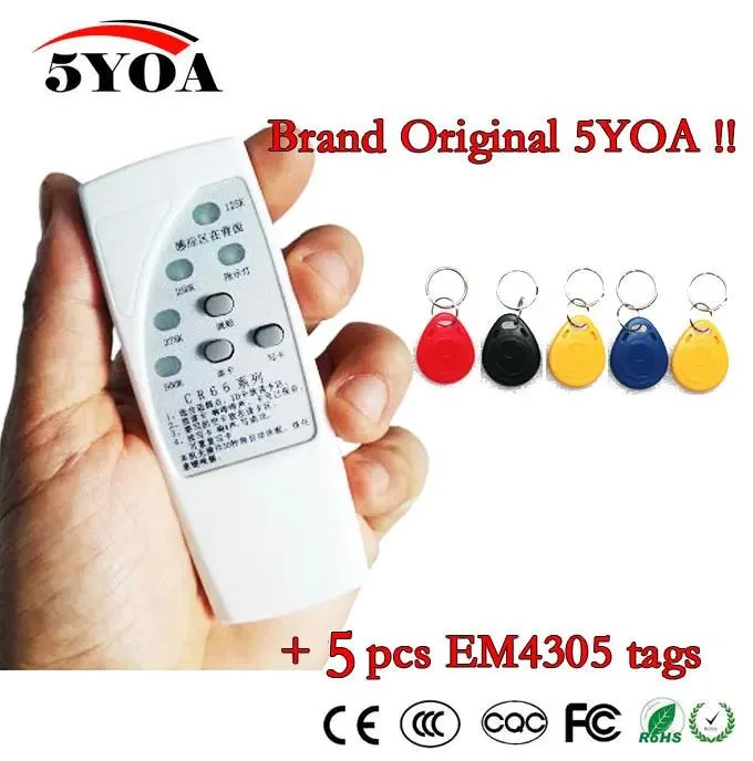 Handheld RFID copier with five coloured keyfobs attached