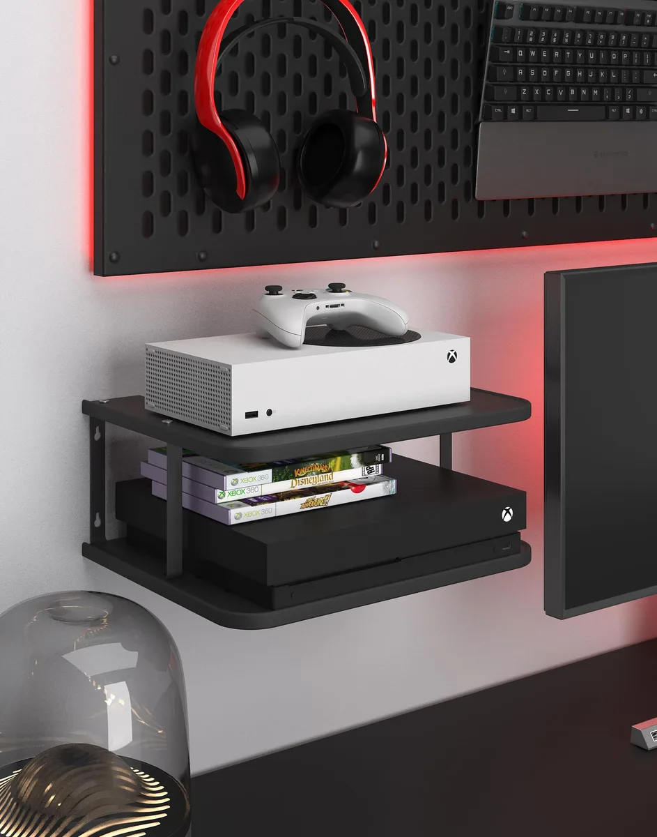 Black floating wall shelf with two foldable tiers for projector or console