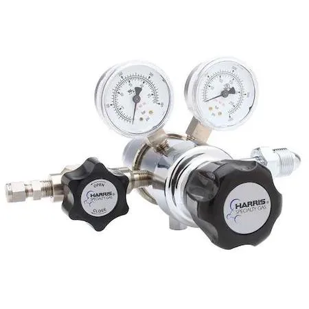 Brass two-stage gas regulator with pressure gauges and control knob