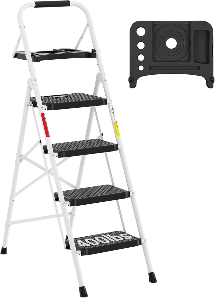 White four-step steel ladder folded flat showing slim profile and tool tray