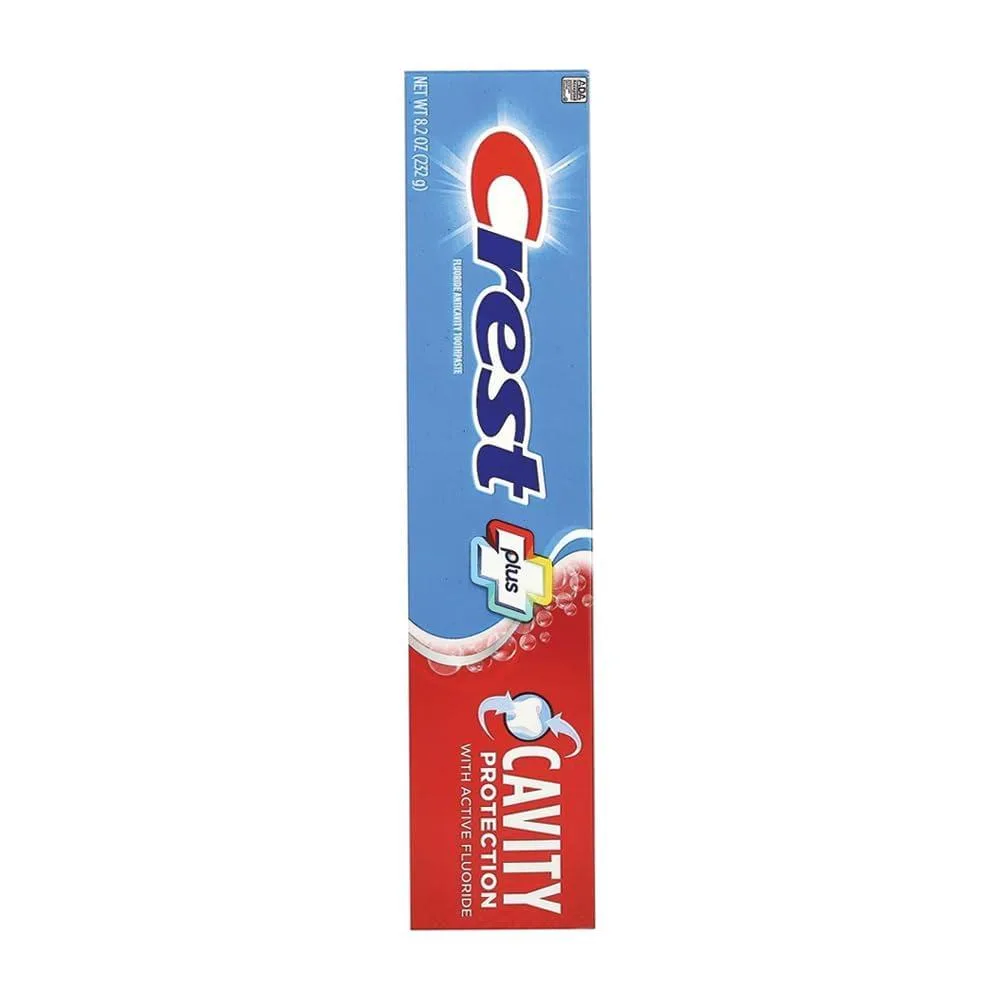 Three white toothpaste tubes in rectangular box