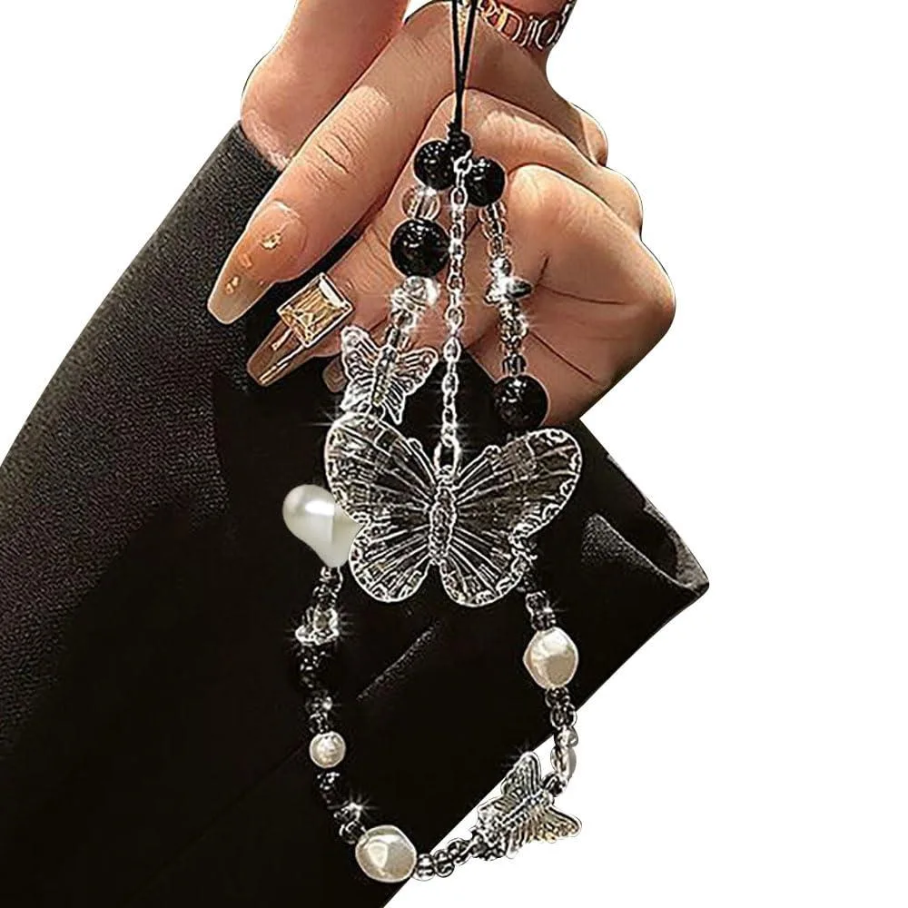 Black and white beaded phone charm with crystal butterfly and heart pendants on hanging rope