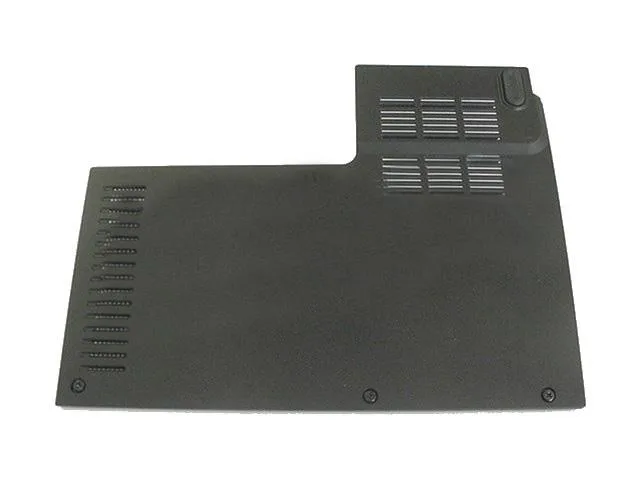 Small rectangular plastic cover for Dell XPS M1330 memory slot, dark finish, shows minor scuffs