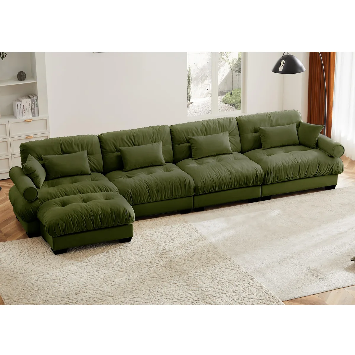 Olive green velvet L-shaped sectional sofa with bolstered armrests and scatter cushions
