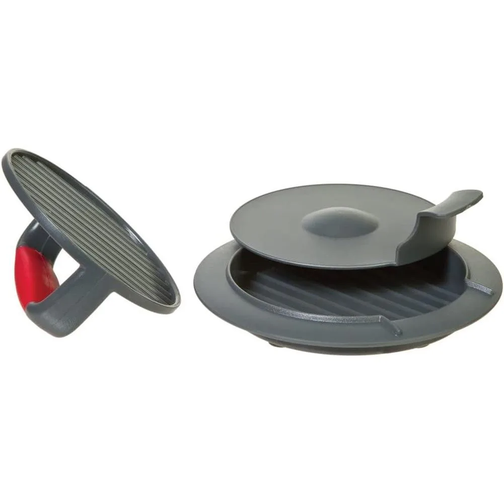 Grey burger press with non-stick surface, dimple insert, non-skid base and comfort-grip pusher