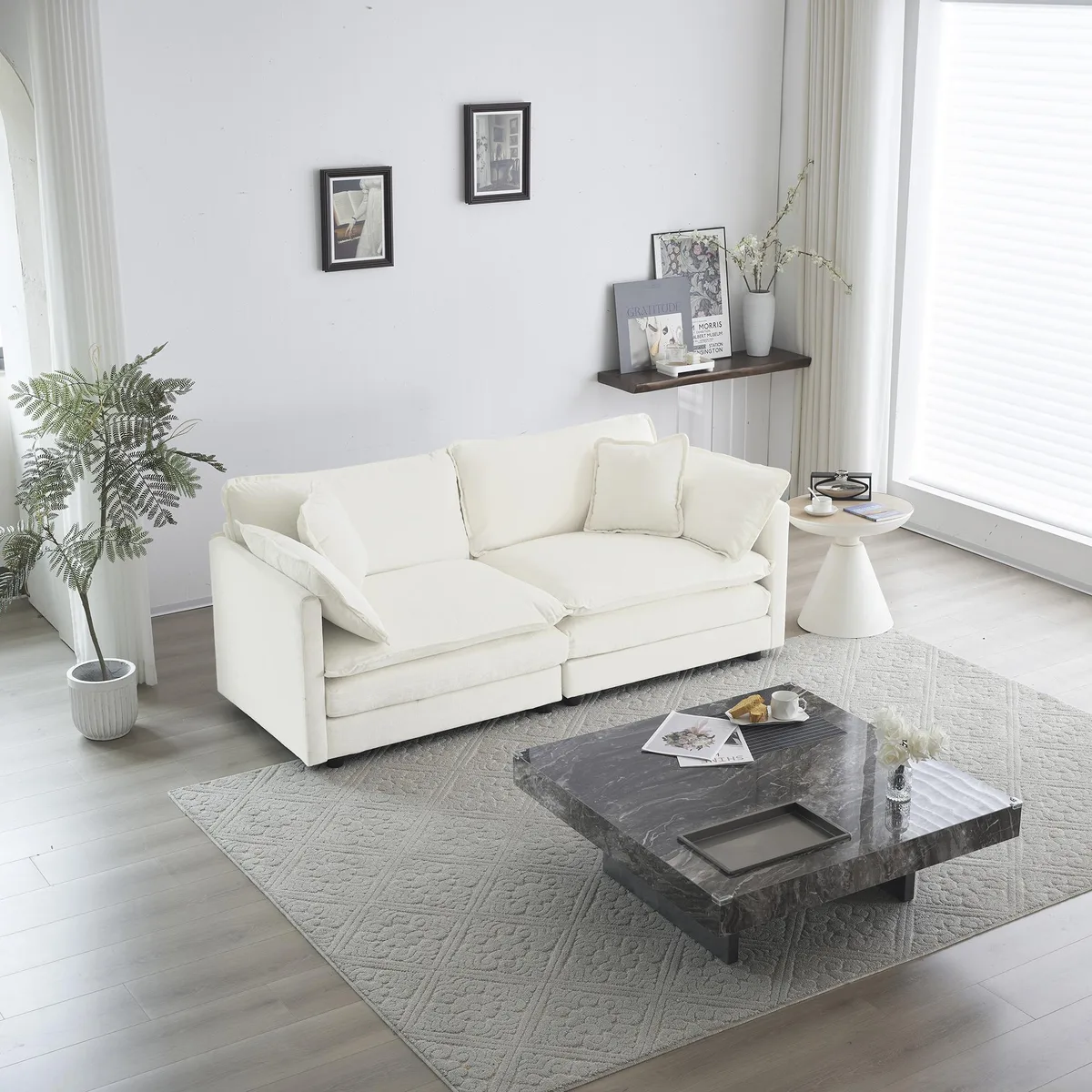 White chenille loveseat with deep seat and four pillows