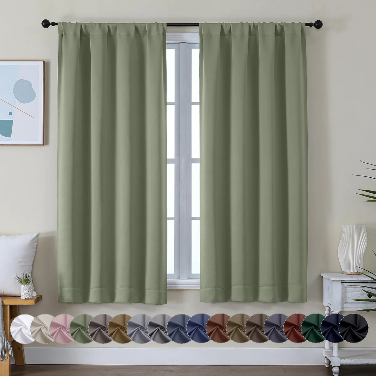 Two sage green fabric curtain panels folded flat, rod pocket top, 40 by 63 inches each