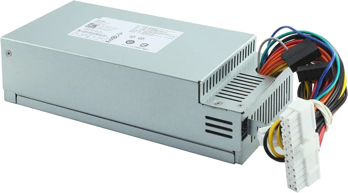 Rectangular black power supply unit with cooling vents and multiple cable connectors