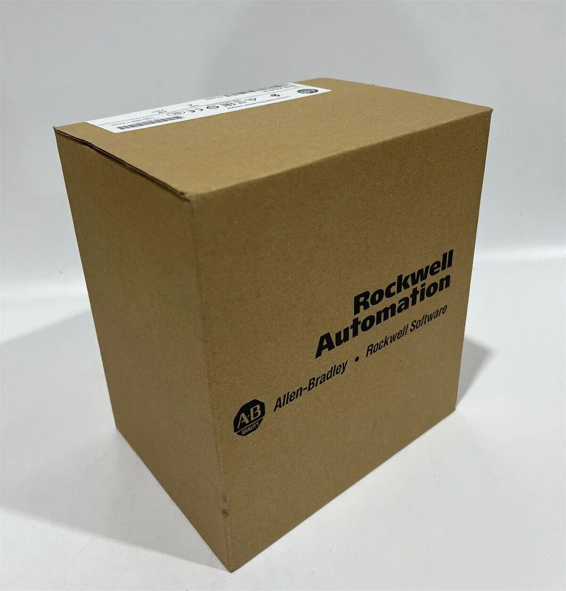 Compact rectangular industrial adapter in light grey plastic housing with front label and terminal connectors