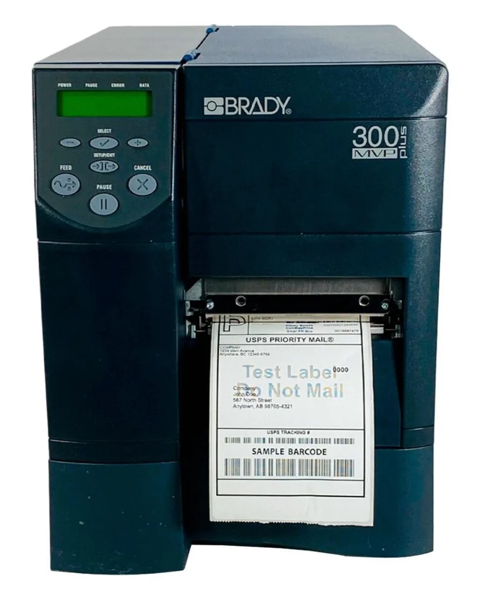 Industrial thermal label printer, grey rectangular body, serial and parallel ports visible
