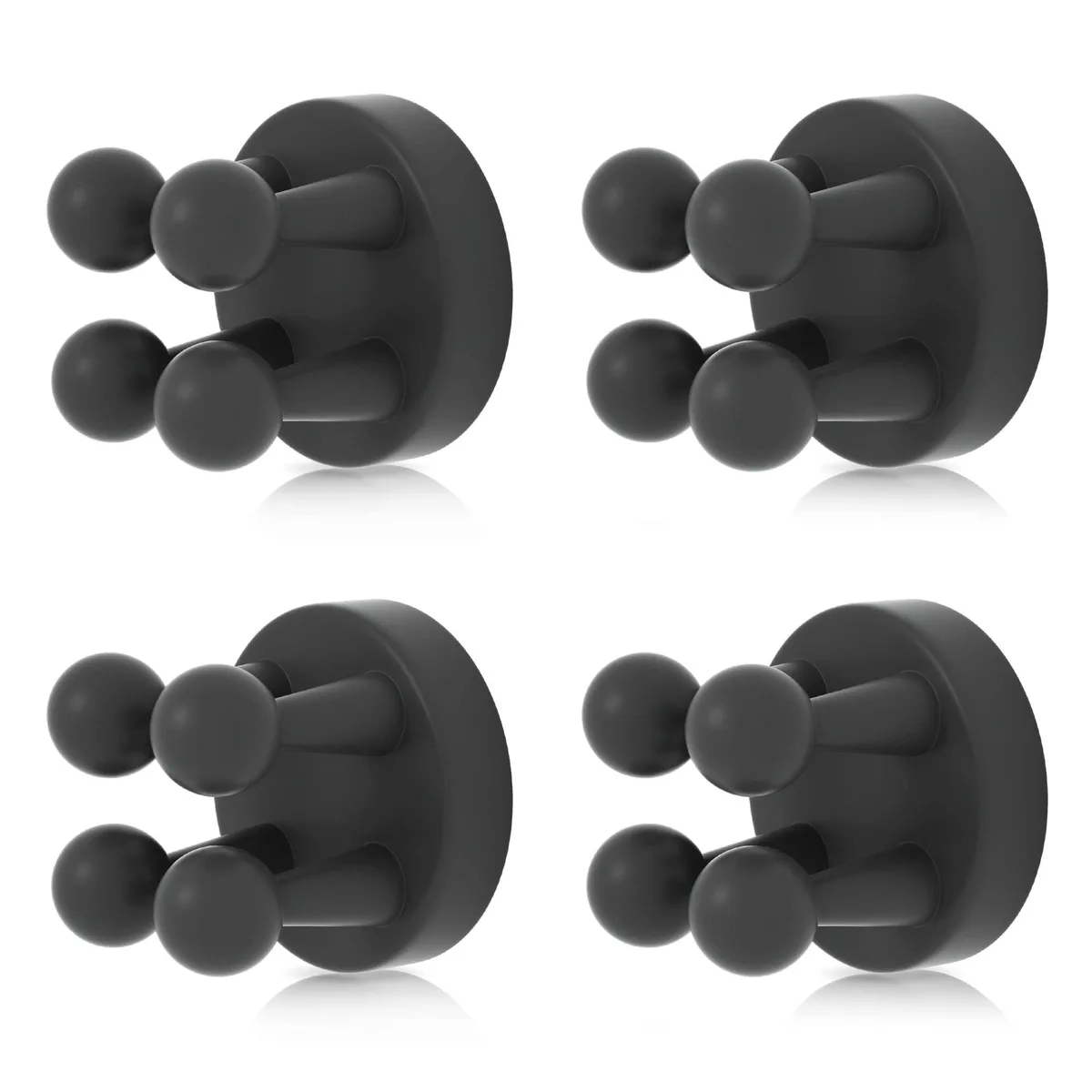 Four white silicone toothbrush hooks with adhesive backs