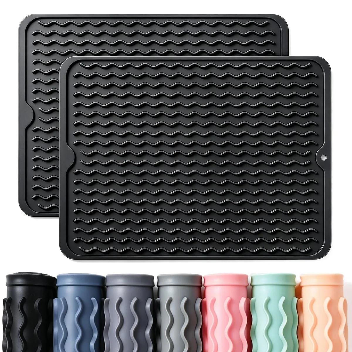 Two black silicone drying mats with ribbed surface, rolled for storage