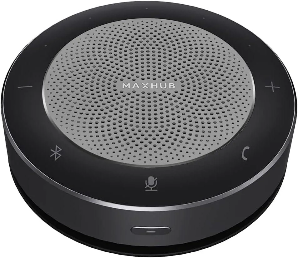 Compact disc-shaped speakerphone with matte finish and subtle control ring