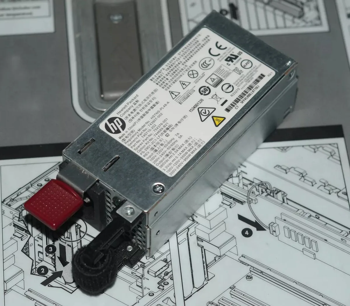 Black rectangular power supply unit with label showing HSTNS-PL48-A