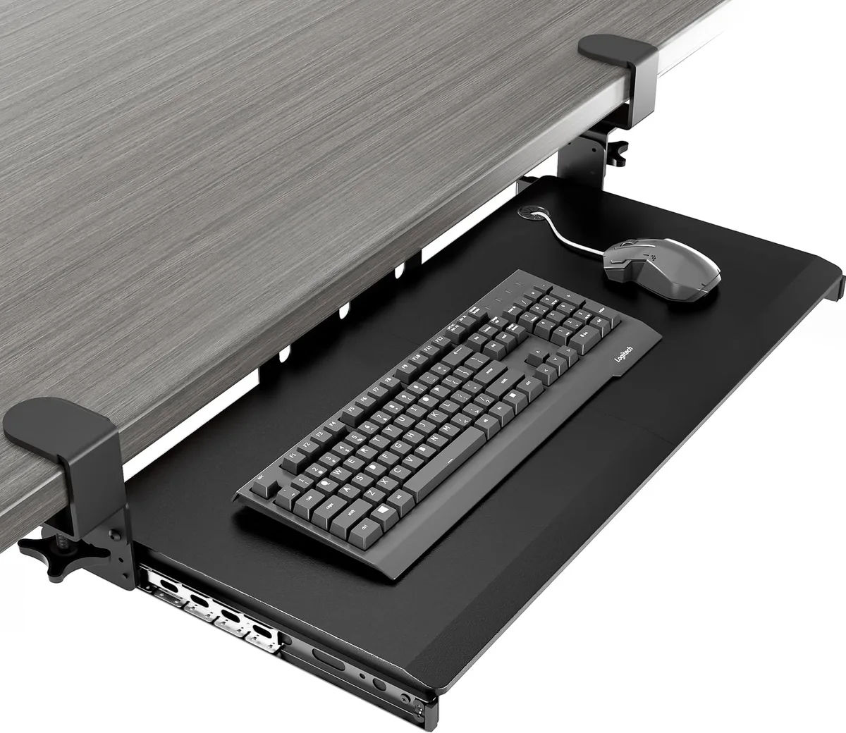 Black under-desk keyboard tray with adjustable C-clamp mount, slide-out platform and cable management