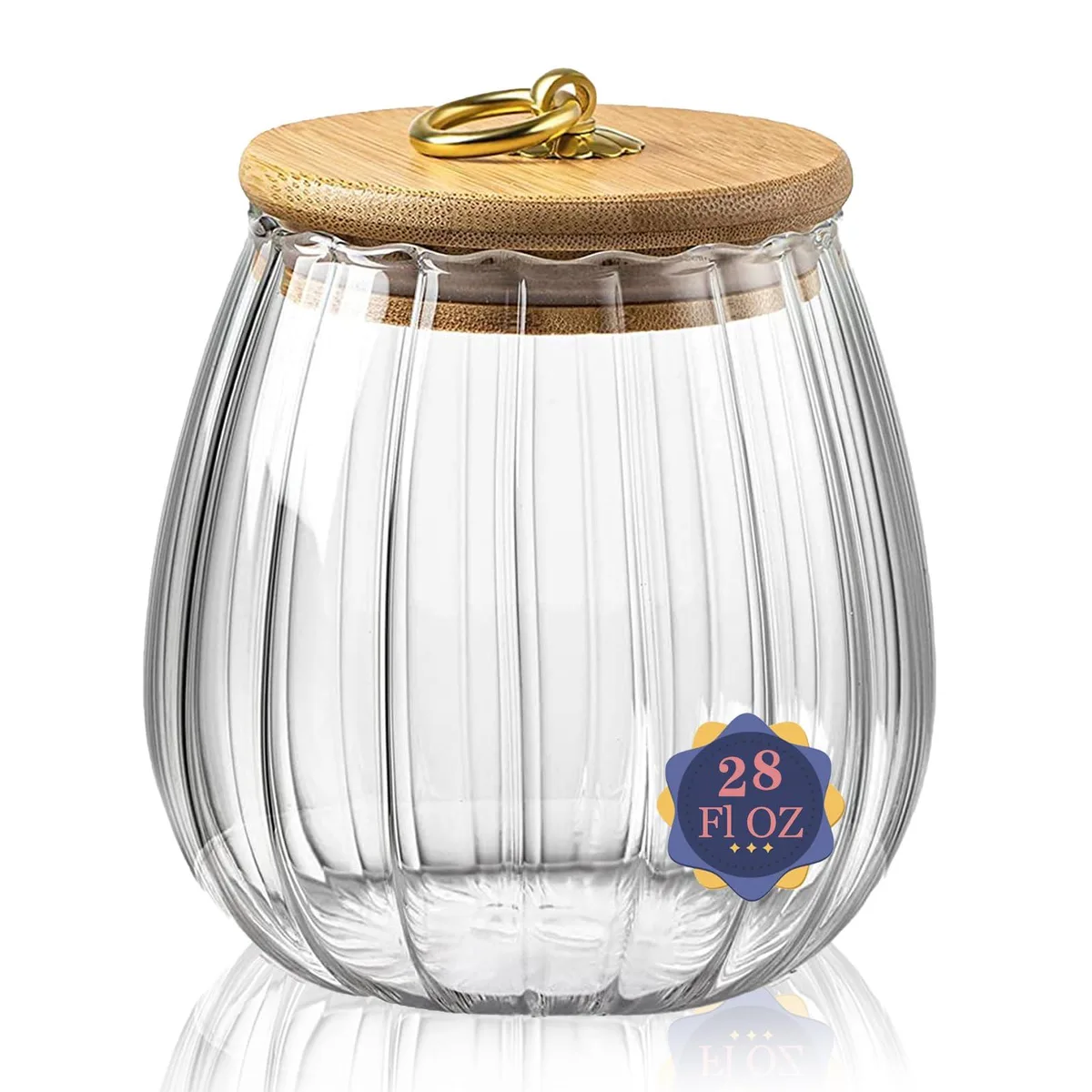 Clear oval glass jar with bamboo lid and metal handle, 3.5 by 4.5 inches